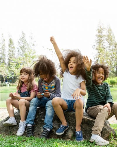 Group of children in a field trips.