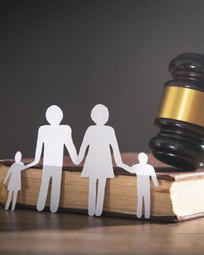 Paper cut family, judge gavel and book. Family Law
